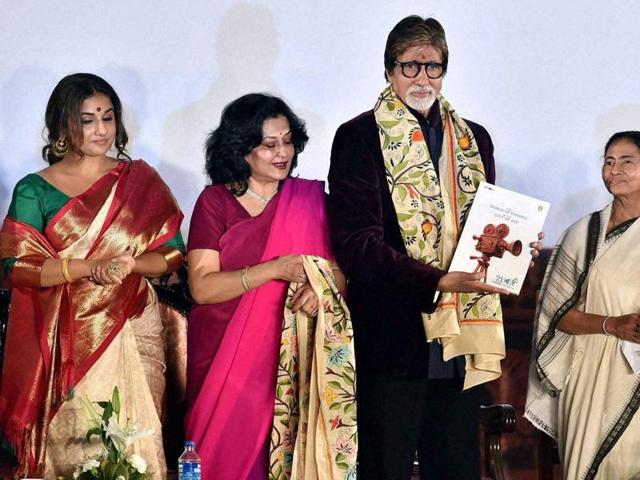 Actor Amitabh Bachchan with West Bengal Chief Minister Mamata Banerjee, Jaya Bachchan, Sharmila Tagore, Vidya Balan and Moushumi Chatterjee during inauguration of 21st Kolkata International Film Festival in Kolkata on Saturday. (PTI)