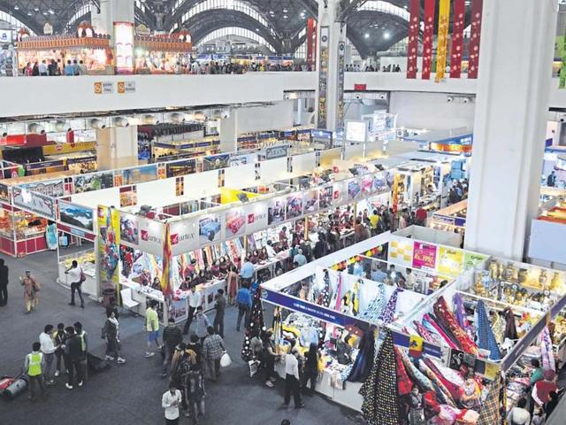 People walk across stalls at the India International Trade Fair at Pragati Maidan on Sunday. (Sushil Kumat/HT) People walk across stalls at the India International Trade Fair at Pragati Maidan on Sunday. (Sushil Kumat/HT)