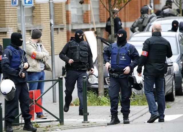 Belgian police stage a raid in search of suspected Muslim fundamentalists. (Reuters) Belgian police stage a raid in search of suspected Muslim fundamentalists. (Reuters)