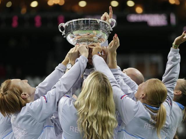 Czech Republic team members celebrate with the Fed Cup trophy after winning the final against Russia in Prague on November 15, 2015. (Reuters Photo) Czech Republic team members celebrate with the Fed Cup trophy after winning the final against Russia in Prague on November 15, 2015. (Reuters Photo)
