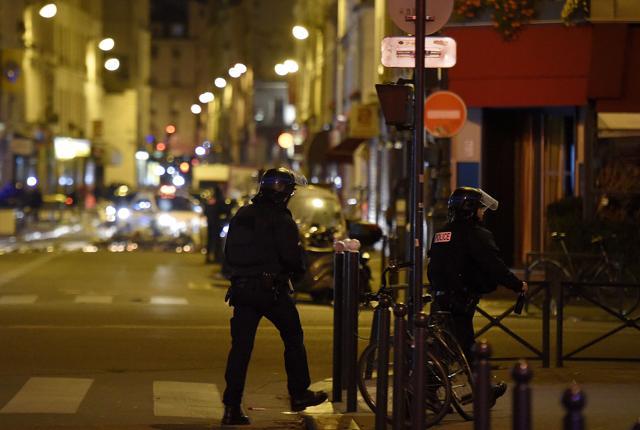 Policemen patrol near the Bataclan Theatre, one of the site of the attacks in Paris on November 15, 2015 in Paris, after a crowd movement led to a panic. (AFP) Policemen patrol near the Bataclan Theatre, one of the site of the attacks in Paris on November 15, 2015 in Paris, after a crowd movement led to a panic. (AFP)