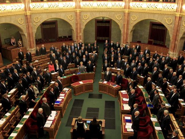 Hungarian representatives take part in a minute of silence in the Parliament in Budapest, Hungary. (REUTERS Photo) Hungarian representatives take part in a minute of silence in the Parliament in Budapest, Hungary. (REUTERS Photo)