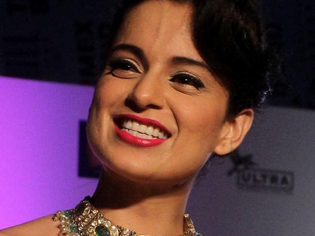 Kangana Ranaut gestures as she walks on stage to accept her award at the Indian Film Festival of Melbourne Awards at Princess Theatre on May 2, 2014 in Melbourne, Australia. (Getty Images for IFFM) Kangana Ranaut gestures as she walks on stage to accept her award at the Indian Film Festival of Melbourne Awards at Princess Theatre on May 2, 2014 in Melbourne, Australia. (Getty Images for IFFM)