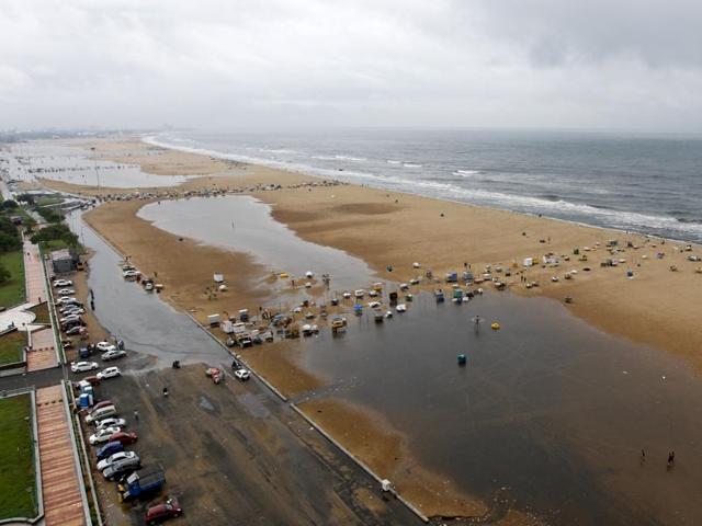 The Marina beach on the Bay of Bengal coast is partly covered with rainwater after heavy rains in Chennai (AP) The Marina beach on the Bay of Bengal coast is partly covered with rainwater after heavy rains in Chennai (AP)