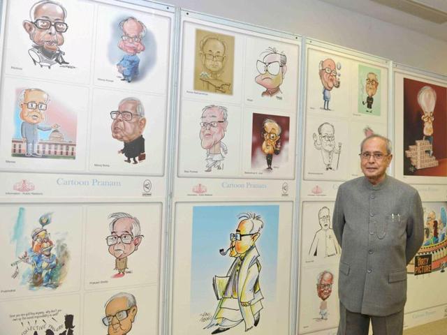 President Pranab Mukherjee stands in front of his cartoons displayed during National Press Day function at Vigyan Bhavan in New Delhi. (PTI) President Pranab Mukherjee stands in front of his cartoons displayed during National Press Day function at Vigyan Bhavan in New Delhi. (PTI)