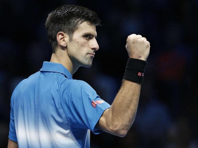 Novak Djokovic holds the year-end World No. 1 trophy after his win over Kei Nishikori. (AFP Photo) Novak Djokovic holds the year-end World No. 1 trophy after his win over Kei Nishikori. (AFP Photo)