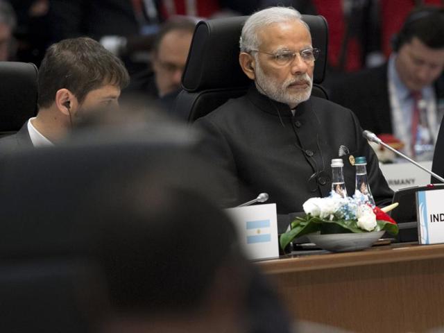 Indian Prime Minister Narendra Modi (R) attends a working session on the Global Economy during the G20 summit in Antalya.(AFP) Indian Prime Minister Narendra Modi (R) attends a working session on the Global Economy during the G20 summit in Antalya.(AFP)