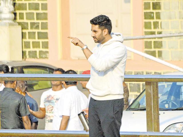 Abhishek Bachchan cheers as his friends play football in Mumbai. (Photo: Yogen Shah/HT)