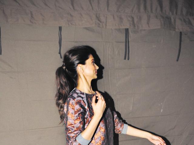Tired of getting clicked guys! Deepika Padukone seems to be saying with that pose... (ht pHOTO)