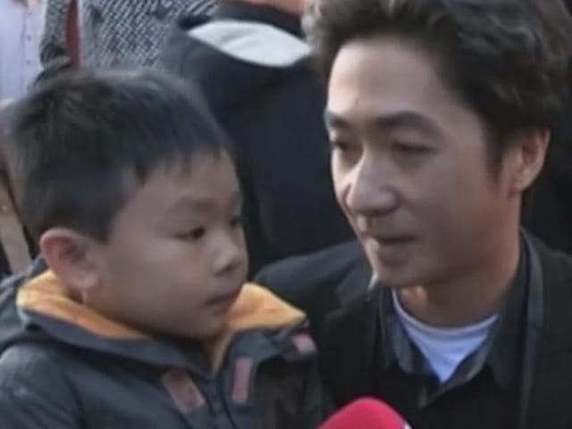 A screen grab of the video of the conversation between the father and his son in Paris.