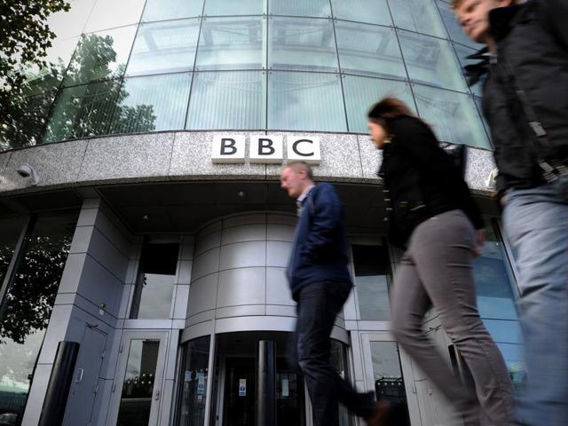 This file picture shows people walking past an entrance to the British Broadcasting Corporation (BBC) Television offices in west London. (AFP Photo) This file picture shows people walking past an entrance to the British Broadcasting Corporation (BBC) Television offices in west London. (AFP Photo)
