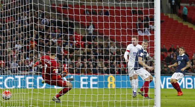 Wayne Rooney scores the second goal for England. (Reuters Photo) Wayne Rooney scores the second goal for England. (Reuters Photo)