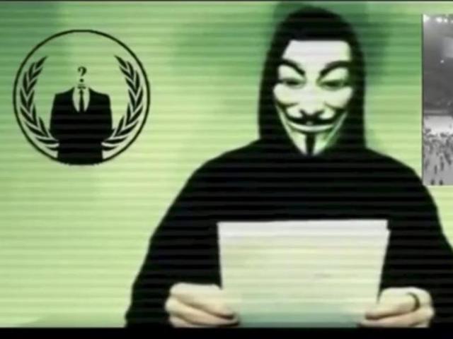 A man wearing a mask associated with Anonymous makes a statement in this still image from a video released on November 16, 2015.(Reuters)