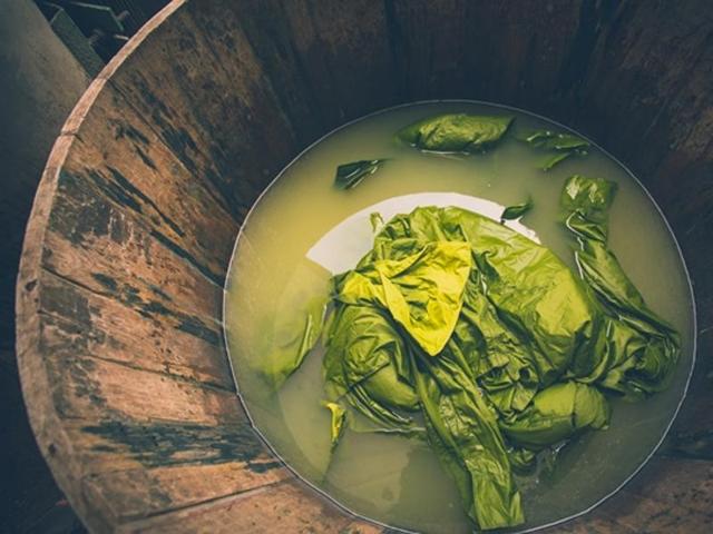 Colour me green: Clothes are often dyed in huge wooden tubs (Photo: Vipul Prasad) 