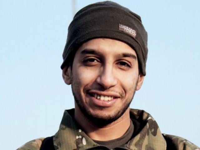 This undated image made available in the Islamic State's English-language magazine Dabiq, shows Belgian Abdelhamid Abaaoud. Abaaoud’s fate was unknown on Wednesday after a massive police raid in a suburb of the city that left at least two dead, including a female suicide bomber. (AP) This undated image made available in the Islamic State's English-language magazine Dabiq, shows Belgian Abdelhamid Abaaoud. Abaaoud’s fate was unknown on Wednesday after a massive police raid in a suburb of the city that left at least two dead, including a female suicide bomber. (AP)