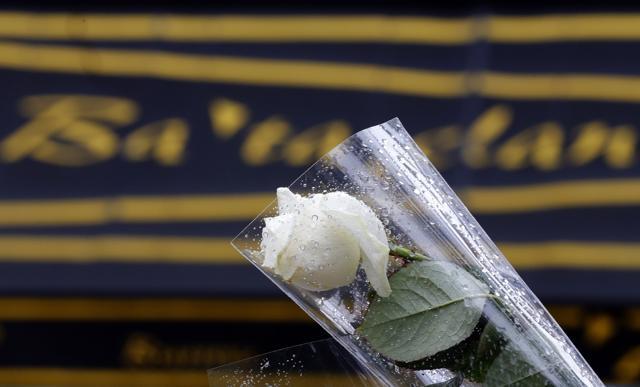 A rose placed as tribute to the fallen, placed in front of the Bataclan concert hall in Paris. (AP Photo)
