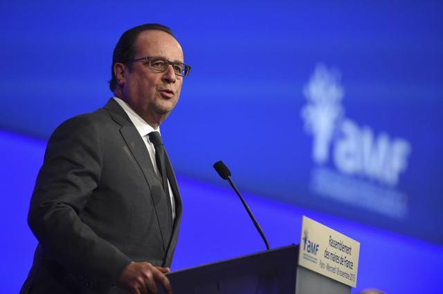 French President Francois Hollande delivers a speech during a meeting of French mayors in Paris, France. (Reuters Photo) French President Francois Hollande delivers a speech during a meeting of French mayors in Paris, France. (Reuters Photo)