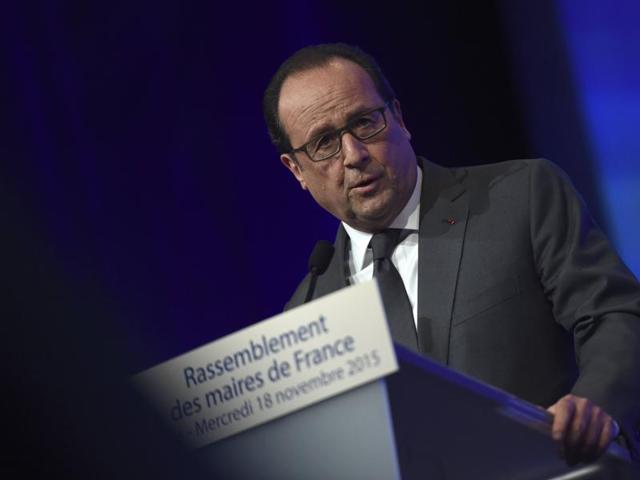 President Francois Hollande delivers a speech during a meeting of French mayors in Paris. (REUTERS) President Francois Hollande delivers a speech during a meeting of French mayors in Paris. (REUTERS)