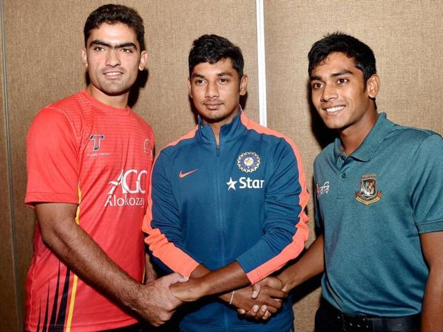 U-19 Afghanistan Captain Ihsanullah Janat, India captain Ricky Bhui and Bangladesh Captain Mehidy Hasan Miraz join hands together during a photo session on the eve of the start of U-19 Cricket Tri-series one day cricket tournament in Kolkata.(PTI Photo)