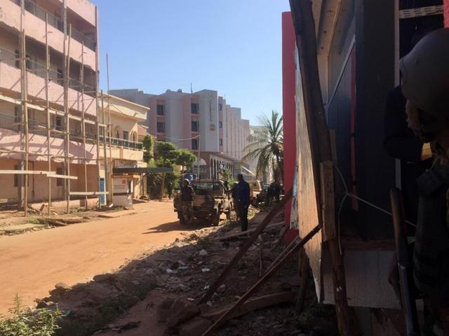 Another shot of Malian troops outside the hotel. (AFP)
