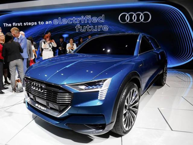 German premium auto giant Audi is also flexing its muscles in the American auto battlefield by presenting e-tron Quattro concept car during the Los Angeles Auto Show, that closes on November 29. (REUTERS) German premium auto giant Audi is also flexing its muscles in the American auto battlefield by presenting e-tron Quattro concept car during the Los Angeles Auto Show, that closes on November 29. (REUTERS)