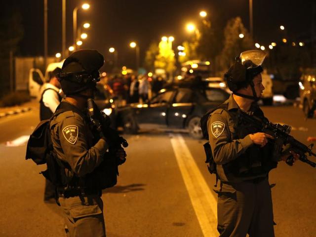 At least one attacker opened fire from a car then crashed into a group of pedestrians near a Jewish settlement in the West Bank, police and the army said. (AFP Photo) At least one attacker opened fire from a car then crashed into a group of pedestrians near a Jewish settlement in the West Bank, police and the army said. (AFP Photo)