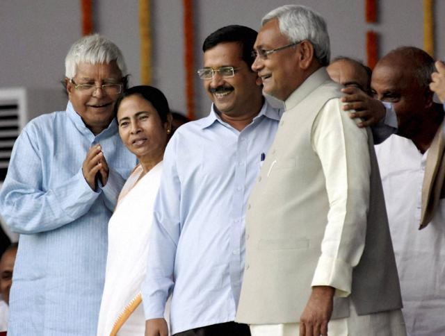 West Bengal chief minister Mamata Banerjee, Delhi chief minister Arvind Kejriwal, RJD chief Lalu Prasad with Bihar chief minister Nitish Kumar during the swearing-in ceremony of the new government at Gandhi Maidan in Patna on Friday. (PTI) West Bengal chief minister Mamata Banerjee, Delhi chief minister Arvind Kejriwal, RJD chief Lalu Prasad with Bihar chief minister Nitish Kumar during the swearing-in ceremony of the new government at Gandhi Maidan in Patna on Friday. (PTI)