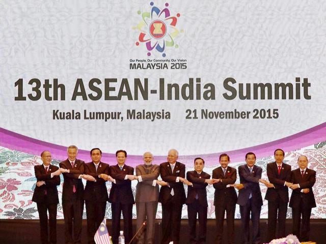 Prime Minister Narendra Modi with other leaders during a group photo at the 13th ASEAN-India Summit in Kuala Lumpur, Malaysia. (PTI)
