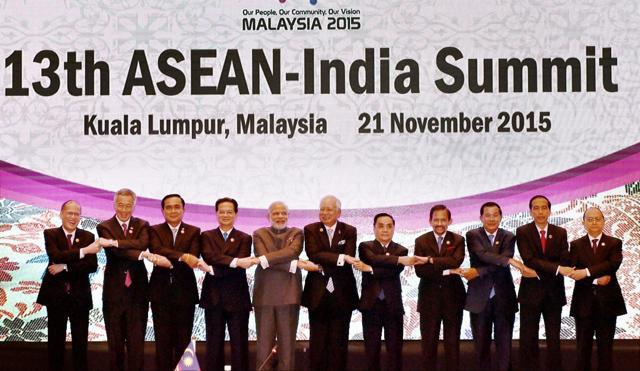 Prime Minister Narendra Modi join hands with other leaders during a group photo at the 13th ASEAN-India Summit in Kuala Lumpur, Malaysia on Nov 21, 2015. (PTI) Prime Minister Narendra Modi join hands with other leaders during a group photo at the 13th ASEAN-India Summit in Kuala Lumpur, Malaysia on Nov 21, 2015. (PTI)