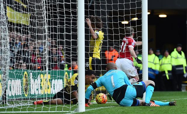 Troy Deeney (L) and Watford goalkeeper Heurelho Gomes (R) stare at the ball after Deeney had deflected the ball into his own net for Manchester United's second goal. (AFP Photo) Troy Deeney (L) and Watford goalkeeper Heurelho Gomes (R) stare at the ball after Deeney had deflected the ball into his own net for Manchester United's second goal. (AFP Photo)