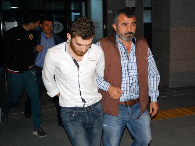 A 26-year old Belgian citizen Ahmet Dahmani is escorted by a plain clothes police officer on November 20, 2015 in Antalya. Turkish police have arrested a Belgian man of Moroccan origin on suspicion he scouted out the target sites for Islamic State in attacks that killed 129 people in Paris a week ago. (AFP Photo) A 26-year old Belgian citizen Ahmet Dahmani is escorted by a plain clothes police officer on November 20, 2015 in Antalya. Turkish police have arrested a Belgian man of Moroccan origin on suspicion he scouted out the target sites for Islamic State in attacks that killed 129 people in Paris a week ago. (AFP Photo)