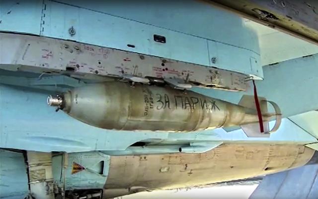 In this photo made from video released by Russian Defense Ministry official web site "For Paris" is written on a bomb attached to a Russian war plane in preparation for a combat mission in Syria, according to information released by Russian Defense Ministry. (AP) In this photo made from video released by Russian Defense Ministry official web site "For Paris" is written on a bomb attached to a Russian war plane in preparation for a combat mission in Syria, according to information released by Russian Defense Ministry. (AP)