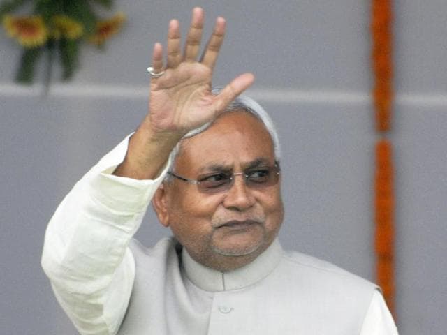 Lalu Yadav and Nitish Kumar during the oath taking ceremony at Gandhi Maidan in Patna on Friday. (AP Dube/HT Photo) Lalu Yadav and Nitish Kumar during the oath taking ceremony at Gandhi Maidan in Patna on Friday. (AP Dube/HT Photo)