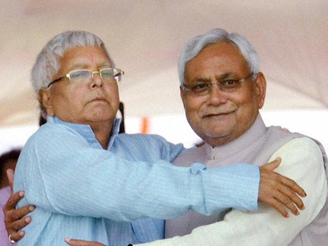 Rashtriya Janata Dal (RJD) leader Lalu Prasad Yadav, left, hugs Nitish Kumar during the oath-taking ceremony of the latter as the Bihar chief minister in Patna. (PTI Photo) Rashtriya Janata Dal (RJD) leader Lalu Prasad Yadav, left, hugs Nitish Kumar during the oath-taking ceremony of the latter as the Bihar chief minister in Patna. (PTI Photo)