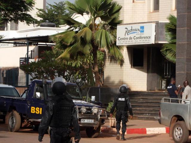 Mali police walk outside one of the entrances to the Radisson Blu hotel's conference center after an attack by gunmen on the hotel in Bamako, Mali. (AP Photo) Mali police walk outside one of the entrances to the Radisson Blu hotel's conference center after an attack by gunmen on the hotel in Bamako, Mali. (AP Photo)