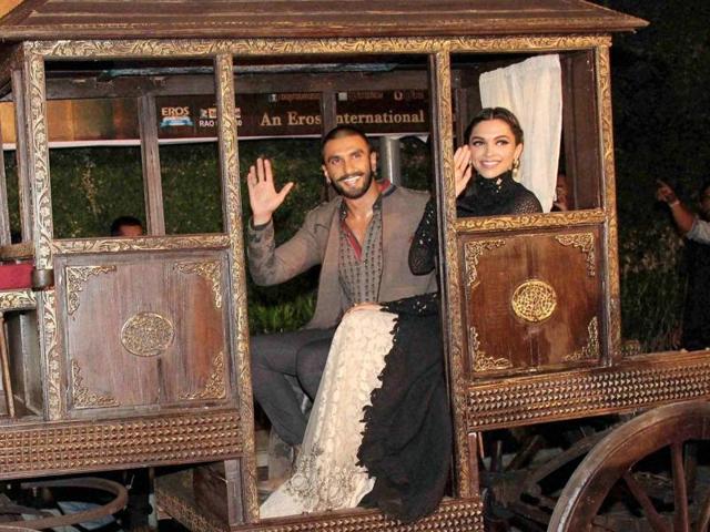 Ranveer Singh and Deepika Padukone in a chariot at the trailer Launch of Bajirao Mastani in Mumbai on Friday. (PTI)