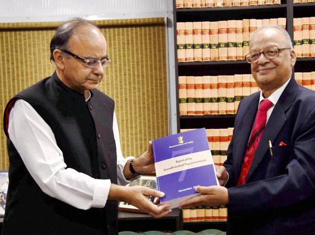 Finance Minister Arun Jaitley receiving the report of Seventh Pay Commission from its Chairman Justice A K Mathur in New Delhi on Thursday. (PTI Photo) Finance Minister Arun Jaitley receiving the report of Seventh Pay Commission from its Chairman Justice A K Mathur in New Delhi on Thursday. (PTI Photo)
