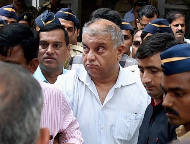 Peter Mukerjea was produced by the CBI at the Esplanade court in Mumbai on Friday in connection with Sheena Bora murder case. (PTI) Peter Mukerjea was produced by the CBI at the Esplanade court in Mumbai on Friday in connection with Sheena Bora murder case. (PTI)