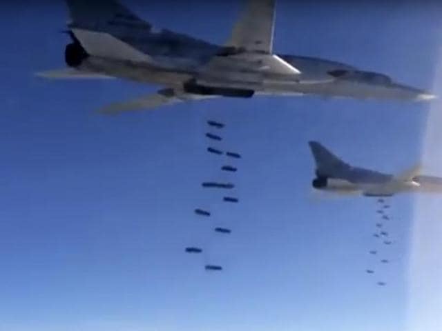In this photo made from video released from Russian Defense Ministry official website, Russian air force Tu-22M3 bombers drop bombs on a target in Syria as part of a Russian air campaign against targets in Syria, according to information provided by Russian Defense Ministry. (AP) In this photo made from video released from Russian Defense Ministry official website, Russian air force Tu-22M3 bombers drop bombs on a target in Syria as part of a Russian air campaign against targets in Syria, according to information provided by Russian Defense Ministry. (AP)