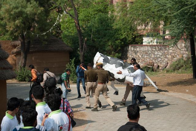 Policemen takeaway the installation. (Facebook: Chintan Upadhyay) Policemen takeaway the installation. (Facebook: Chintan Upadhyay)