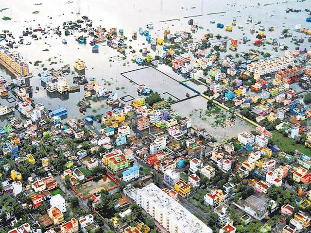 The fallout of climate change: An aerial photo taken on Tuesday shows flooding in Kanchipuram district, on the outskirts of Chennai. (PTI) The fallout of climate change: An aerial photo taken on Tuesday shows flooding in Kanchipuram district, on the outskirts of Chennai. (PTI)