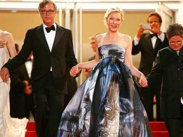 (L-to-R) Rooney Mara, Todd Haynes, Cate Blanchett and US screenwriter Phyllis Nagy leave the Festival palace after the screening of the film Carol Cate is seen in a Giles Deacon dress. (AFP)