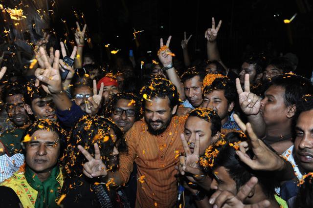 Bangladeshi secular activists celebrate near the Dhaka's Central Jail. (AFP Photo)