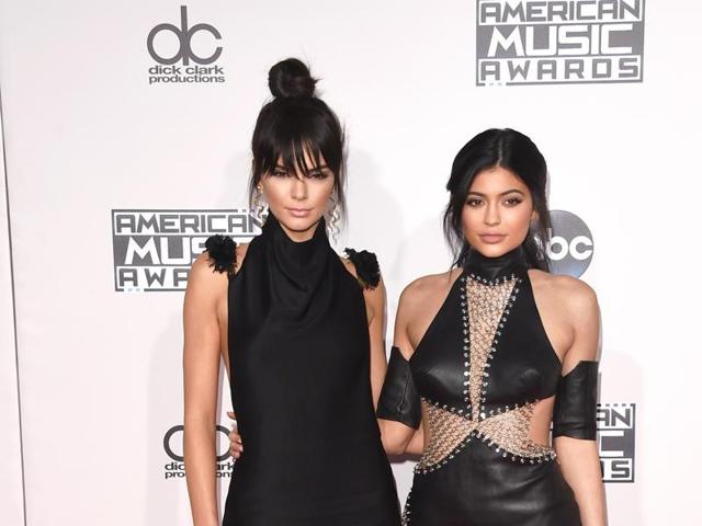 Sisters Kendall and Kylie Jenner  turned up in the classic Kardashian black. (AFP) 