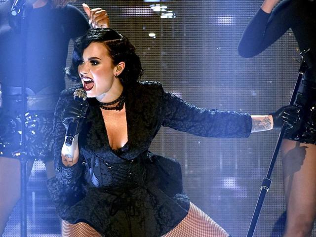 Demi Lovato performs onstage.  (AFP) 