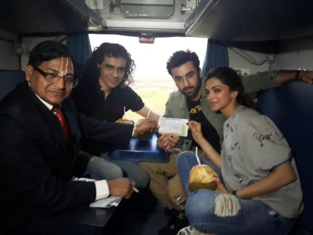 Deepika, Ranbir and Imtiaz show off their ticket during the train journey for Tamasha promotions. (Yogen Shah)