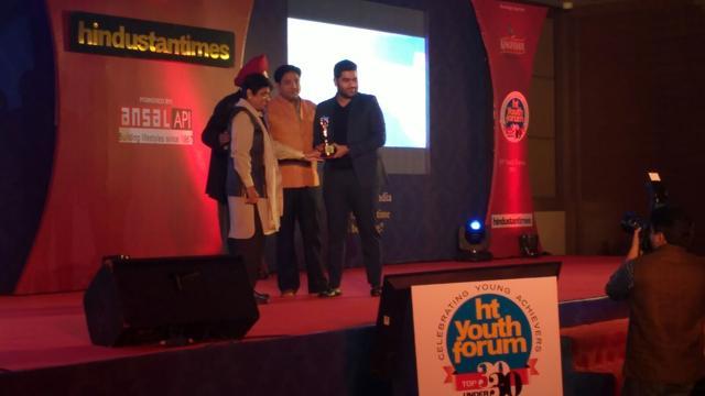 Kiran Bedi and Milkha Singh felicitating writer Sumrit Shahi. Kiran Bedi and Milkha Singh felicitating writer Sumrit Shahi.