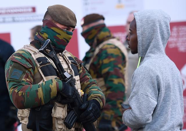 Soldiers patrol as the Belgian capital remains on the highest possible alert level on November 23, 2015 in Brussels. (AFP) Soldiers patrol as the Belgian capital remains on the highest possible alert level on November 23, 2015 in Brussels. (AFP)