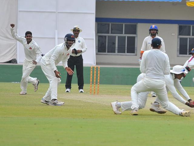 Mumbai skipper Ankit Tare caught off Ankit Sharma on the opening day of Ranji match between Mumbai and Madhya Pradesh in Indore on Monday.(Shankar Mourya/ HT photo) Mumbai skipper Ankit Tare caught off Ankit Sharma on the opening day of Ranji match between Mumbai and Madhya Pradesh in Indore on Monday.(Shankar Mourya/ HT photo)