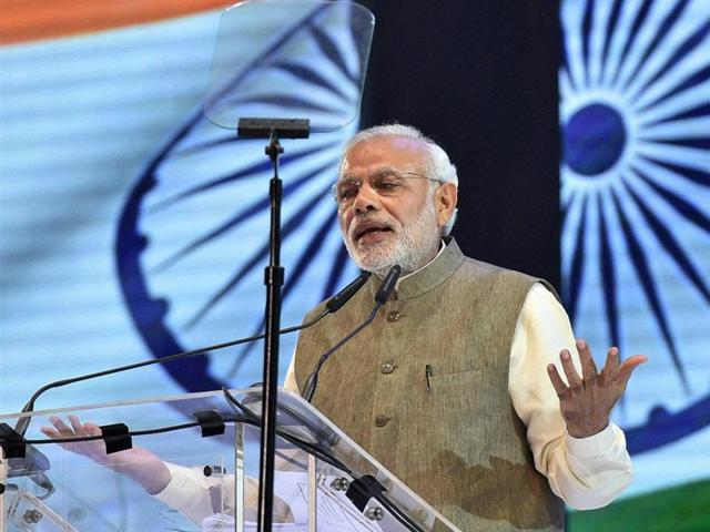 Prime Minister Narendra Modi addresses people from Indian community at an event in Kuala Lumpur, Malaysia, on Sunday .(PTI)